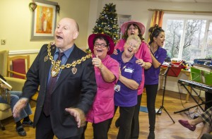 David Petri on keyboard and violinist Carfoline Abbott from the Halle with Pendine Park residents at Cae Bryn care home. The Mayor of Wrexham, Councillor Alan Edwards joined in the fun with staff from left, Lynne Williams, Irene Monks, Yvonne Moran and Olivia Thomas