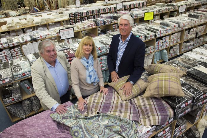 Business is sew good...pictured (Front L/R) are Peter Grimes and Cara Huxley from Simon Boyd and  Michael Coxey .