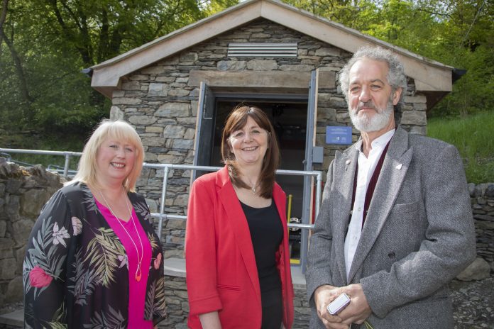 Cadwyn Clwyd; Welsh Government Energy Minister Lesley Griffiths at the opening of the Corwen Hydro; Pictured (centre) Welsh Government Energy Minister Lesley Griffiths at the opening of the Corwen Hydro Project turbine house with Cadwyn Clwyd Company Manager Lowri Owain and Project Chairman Mike Paice .
