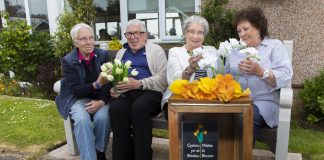 Cartrefi Conwy residents of Park Way , Rhos on Sea who have won Colwyn in Bloom for the last 12 years. and have commissioned the Men’s Shed to build a wooden box to hold one their trophies. Pictured are Margaret Richardson, Chair, Richard Blackwell, Vice chair, Eileen Jones, resident and Marion Weatherill, Secretary.