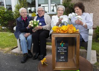 Cartrefi Conwy residents of Park Way , Rhos on Sea who have won Colwyn in Bloom for the last 12 years. and have commissioned the Men’s Shed to build a wooden box to hold one their trophies. Pictured are Margaret Richardson, Chair, Richard Blackwell, Vice chair, Eileen Jones, resident and Marion Weatherill, Secretary.