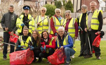 Cartrefi Conwy staff and residents ready to collect litter on the Fron estate in Old Colwyn.