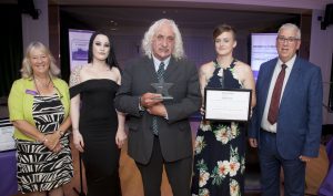 Pictured presenting the Community Champion Award is North Wales Police and Crime Commissioner Arfon Jones with, from left, Deputy Commissioner Ann Griffith, Bobbie Roberts, award winner Kenny Khan and Helen Evans.