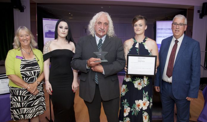 Pictured presenting the Community Champion Award is North Wales Police and Crime Commissioner Arfon Jones with, from left, Deputy Commissioner Ann Griffith, Bobbie Roberts, award winner Kenny Khan and Helen Evans.