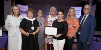 Pictured presenting the Domestic Abuse Support Award to Gorwel is North Wales Police and Crime Commissioner Arfon Jones with, from left, Deputy Commissioner Ann Griffith, Gwyneth Williams, Valmai Squires, Bethan O’Regan, Mair Jones and Rhiannon Thomas.