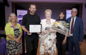 Pictured presenting the Outstanding Achievement Award to Brenda Fogg, of Hope Restored, is North Wales Police and Crime Commissioner Arfon Jones with, from left, Deputy Commissioner Ann Griffith, Sergeant Tom Prytherch and PCSO Pam Hayers.