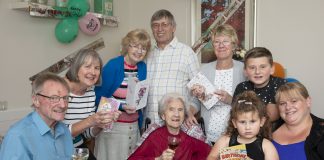 Pendine Park , Hillbury resident Bessie Hughes celebrates her 102nd Birthday with a glass of sweet sherry. Pictured is Bessie Hughes with her nieces and Nephews (from Left) Tony Williams, Wendy Percival, Dianne and Philip Harvey, Myra Campion, Kai Roberts, Evie Roberts and Emma Roberts.