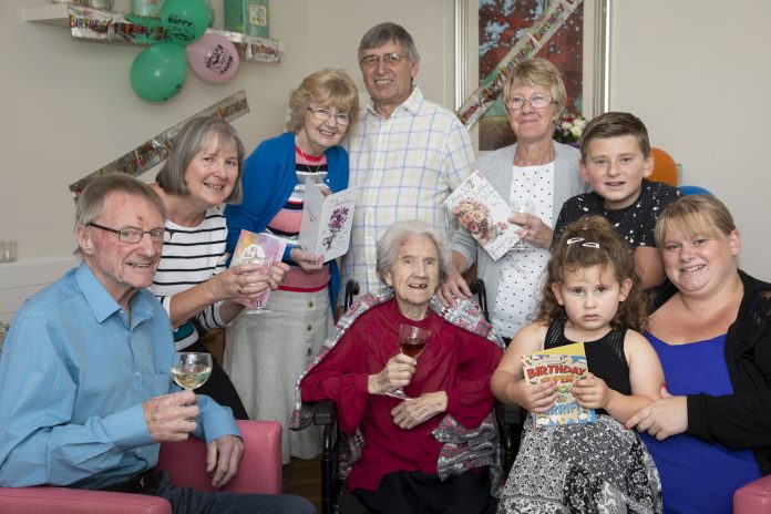 Pendine Park , Hillbury resident Bessie Hughes celebrates her 102nd Birthday with a glass of sweet sherry. Pictured is Bessie Hughes with her nieces and Nephews (from Left) Tony Williams, Wendy Percival, Dianne and Philip Harvey, Myra Campion, Kai Roberts, Evie Roberts and Emma Roberts.