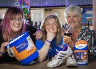 Beth Taylor who is running the Chicago Marathon in aid of motor neurone disease; Pictured is centre Beth Taylor-Lloyd with (from left) Becky Owens and Gill Ryland.