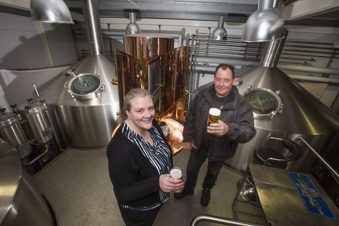 Managing Director Mark Roberts with Donna Hughes, of Wrexham Northern Marches at the Brewery in Wrexham