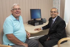 Geoff Turner who has had plastic surgery at Spire Yale Hospital in Wrexham to remove a growth on his nose. Pictured is Geoff Turner with surgeon, Professor Fahmy Fahmy who completed the surgery.